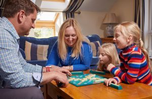 Family Playing Scrabble 2