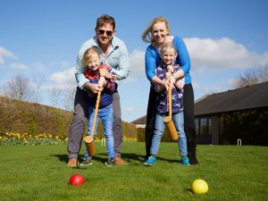 No 4 Family playing croquet