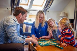 No 5 Family Playing Scrabble