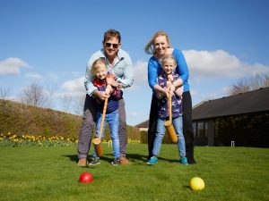No 5 Family playing croquet